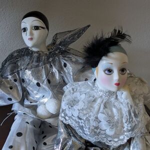 Unique And Gorgeous Porcelain Musical Clown Dolls in Silver and White.